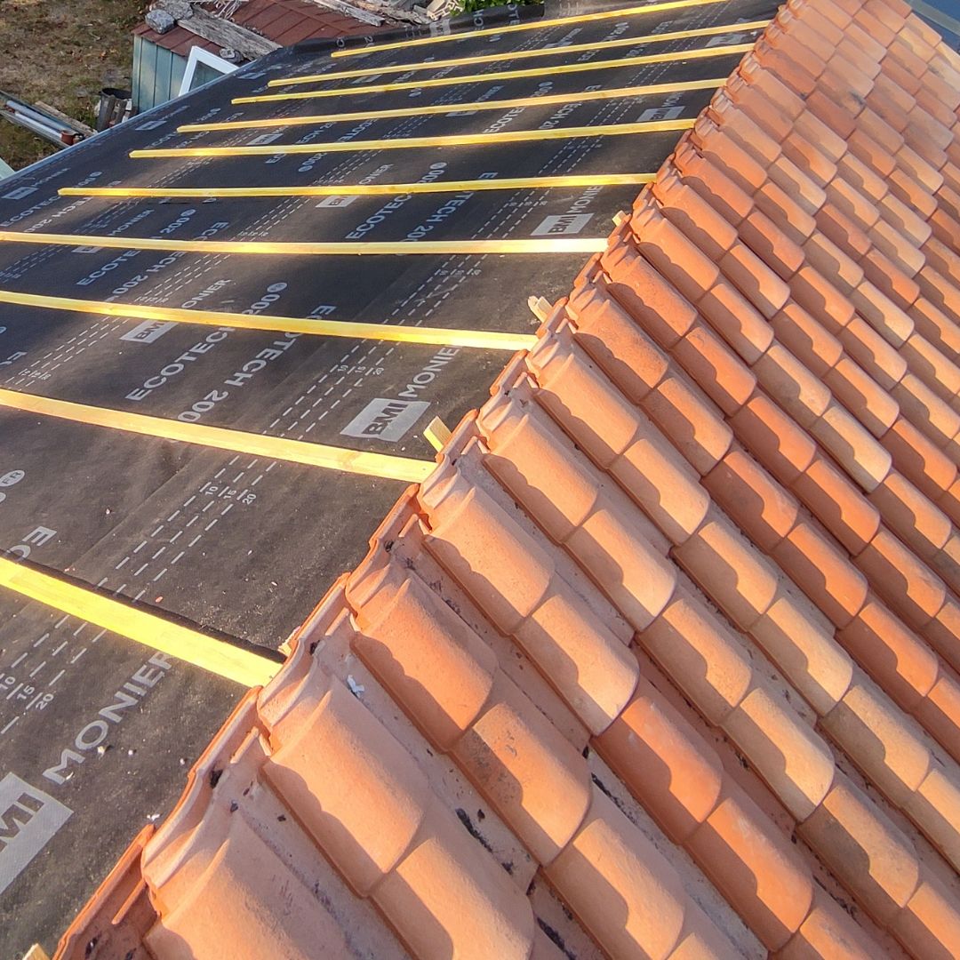 pose d'un écran sous toiture